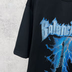 Black T-shirt sleeve with partial blue lightning Eiffel graphic
