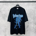 Black short-sleeve T-shirt with blue Eiffel Tower lightning graphic