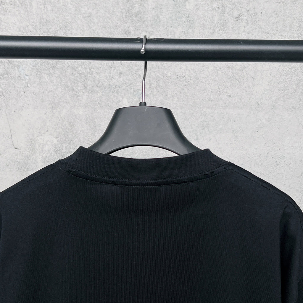 Black T-shirt back with crew neck and hanging tag