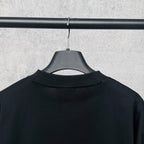 Black T-shirt back with crew neck and hanging tag