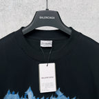 Black T-shirt neckline with inner tag and hanging Balenciaga label