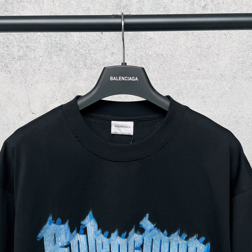Black T-shirt with blue top graphic and crew neckline
