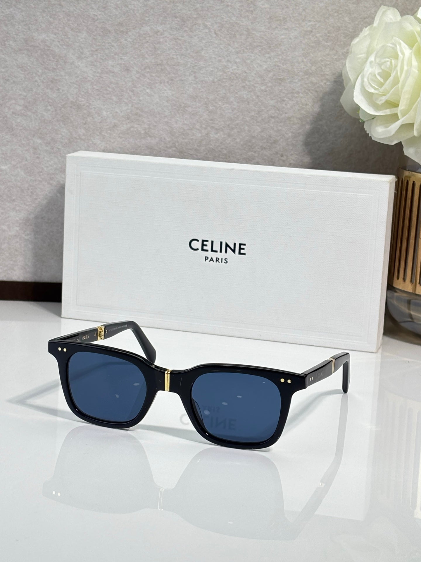 Celine square sunglasses, black frame, blue lenses, gold accents
