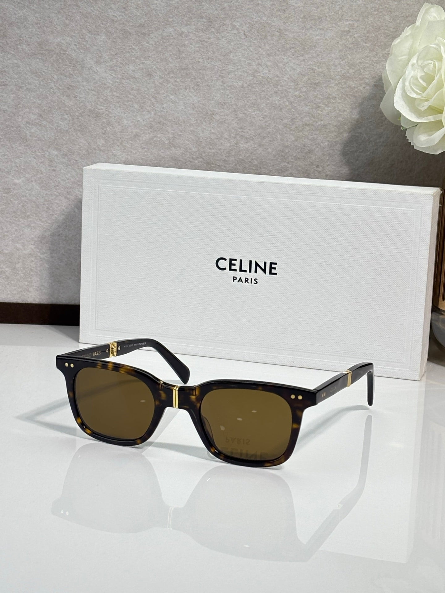 Celine cat-eye sunglasses, black frame with tortoise accents, dark tinted lenses