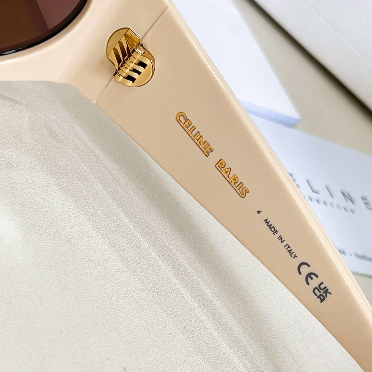 Celine glasses temple hinge with gold emblem and engraved brand mark