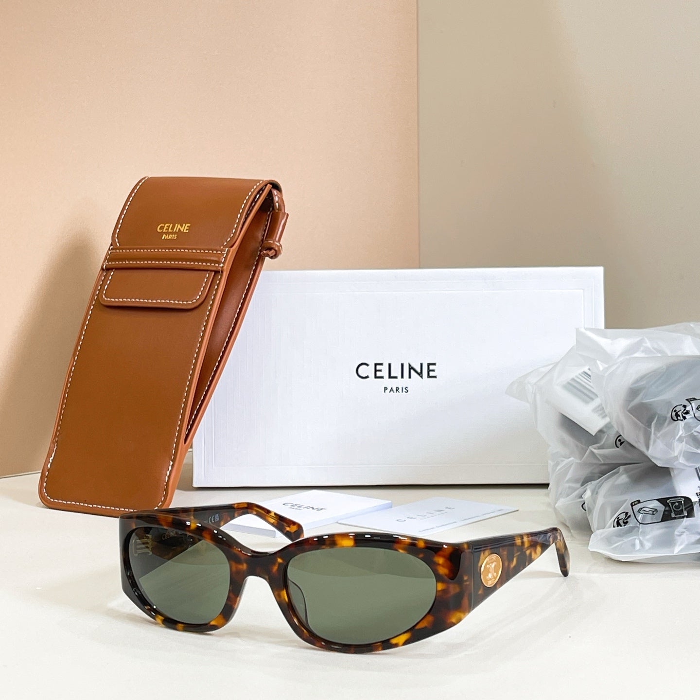 Celine glasses with tortoiseshell frame and dark green-tinted lenses