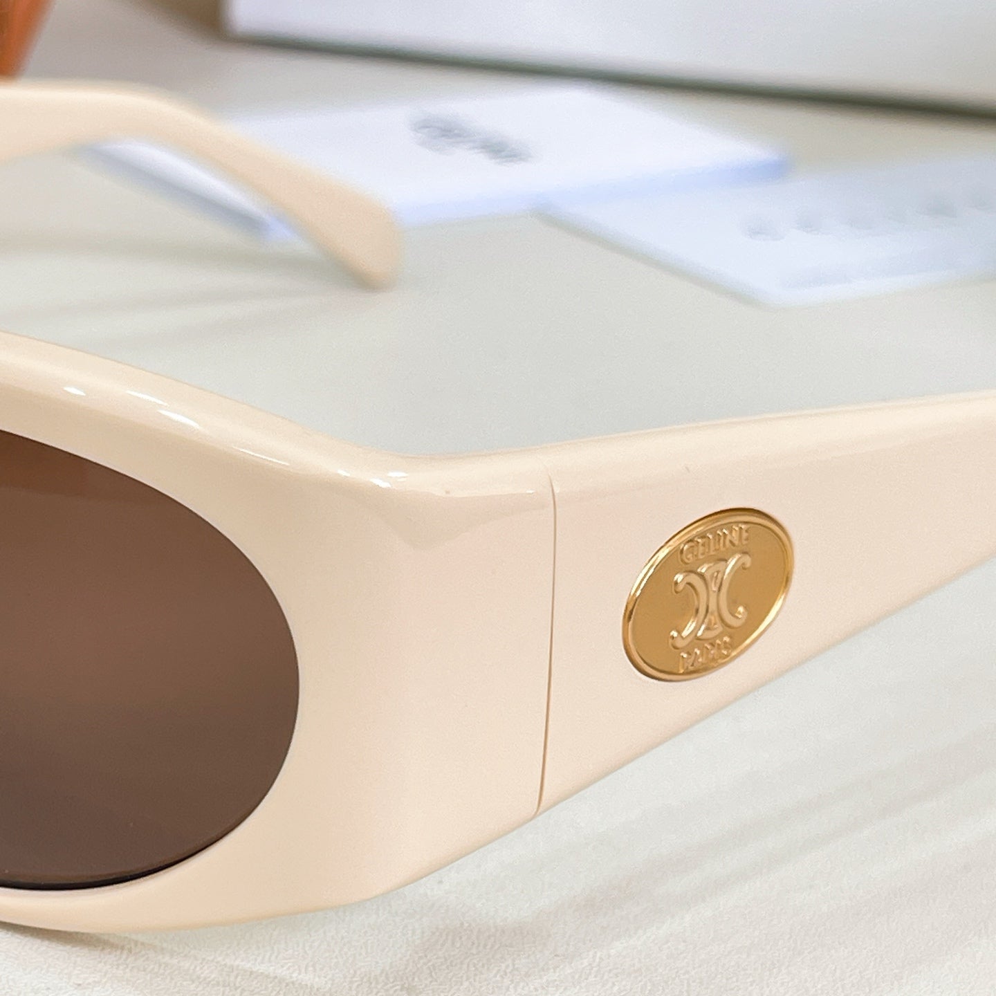 Celine glasses cream frame with gold round logo on temple