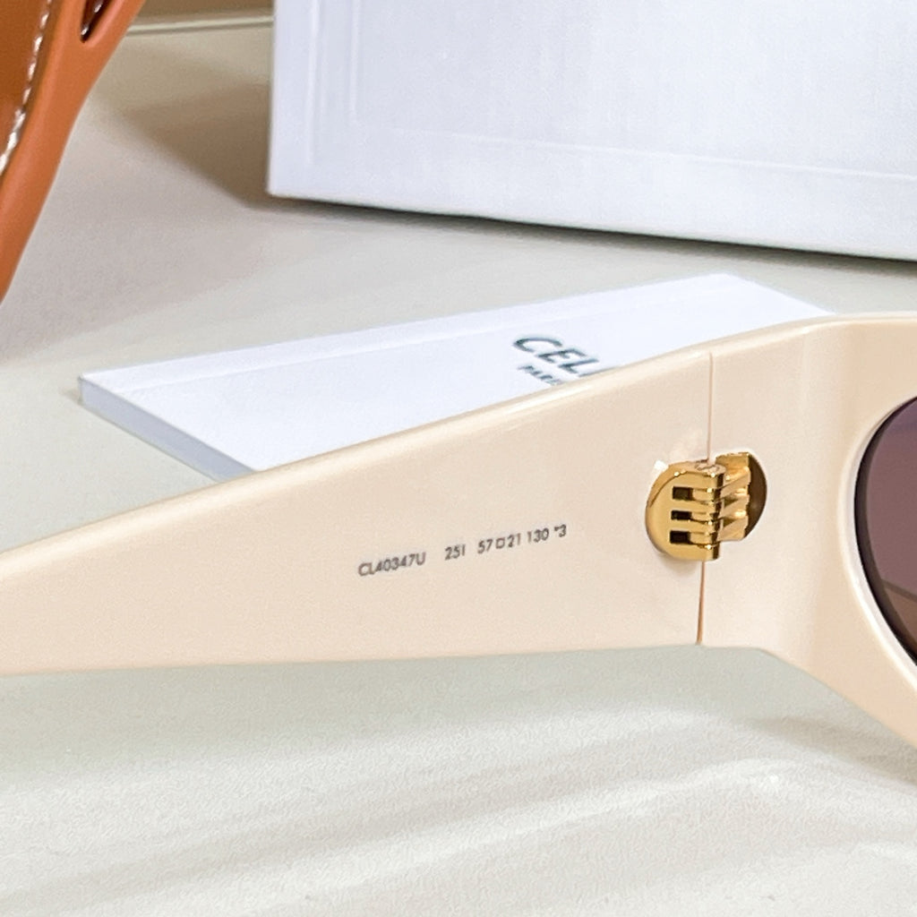 Celine glasses cream temple with engraved model text and hinge detail