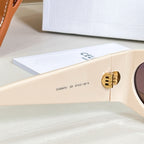 Celine glasses cream temple with engraved model text and hinge detail