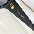 Black sunglasses temple with gold logo and “Celine Paris” text