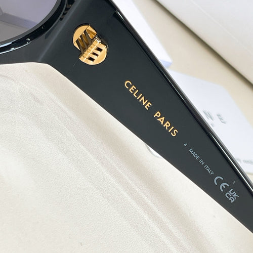 Black sunglasses temple with gold logo and “Celine Paris” text
