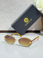 Versace sunglasses: round gold frames, orange gradient lenses, gold-tone temples.