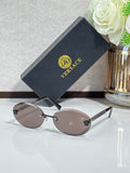Versace sunglasses: round dark frames, gold-tone temples, tinted lenses.
