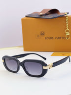 Louis Vuitton glasses, dark blue rectangular frames with gold hinge accents