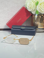 Cartier sunglasses with gold-tone metal frame and beige tinted lenses