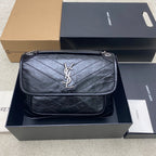 Saint Laurent quilted leather shoulder bag with YSL logo on front flap