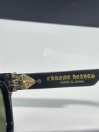 Sunglasses temple with gold text and 'MADE IN JAPAN' marking
