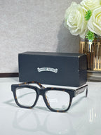 Chrome glasses with dark tortoiseshell rectangular frames and clear lenses
