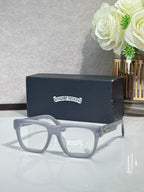 Chrome glasses with light blue rectangular frames and clear lenses