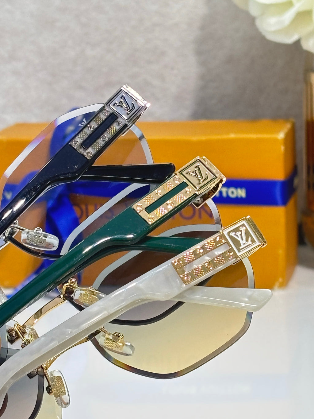 Overlapping round eyeglass frames with gold-tone and color-accent hardware