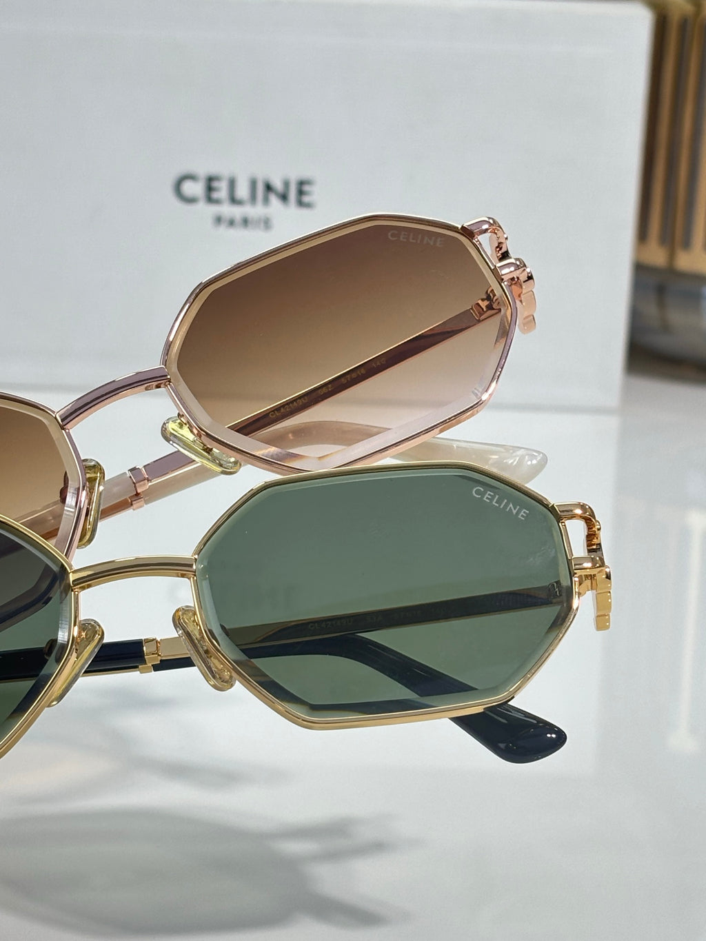 Celine octagonal sunglasses with mixed lens tints and gold-tone frames, close-up