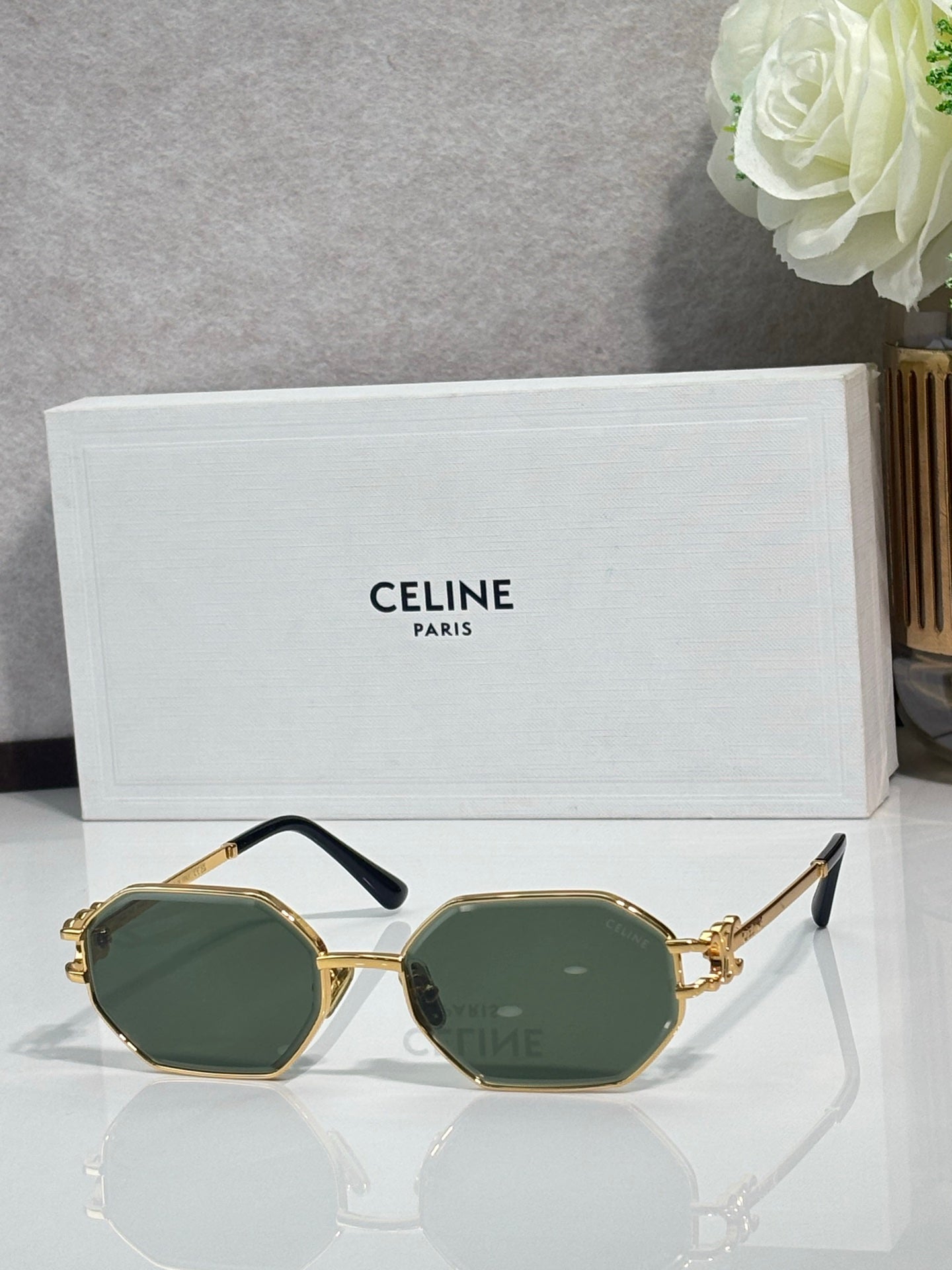 Celine octagonal sunglasses with gold-tone frame and green-tinted lenses