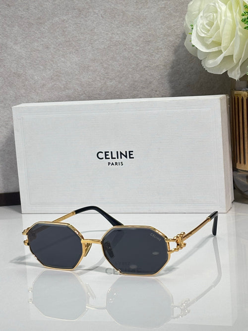 Celine octagonal sunglasses with gold-tone frame and dark blue lenses, front view