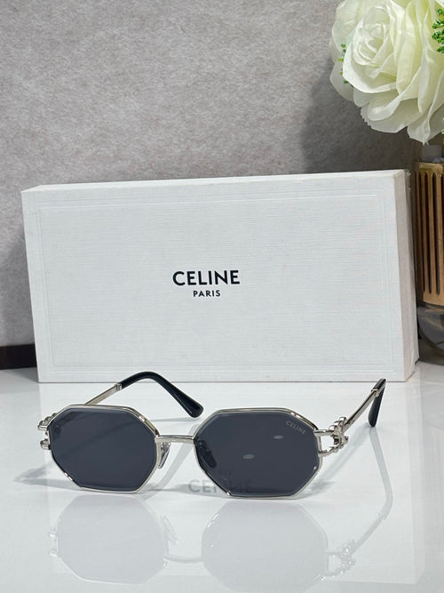 Celine octagonal sunglasses with dark frame, gold accents, and dark blue lenses