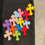Black pants leg with multicolor cross applique embroidery
