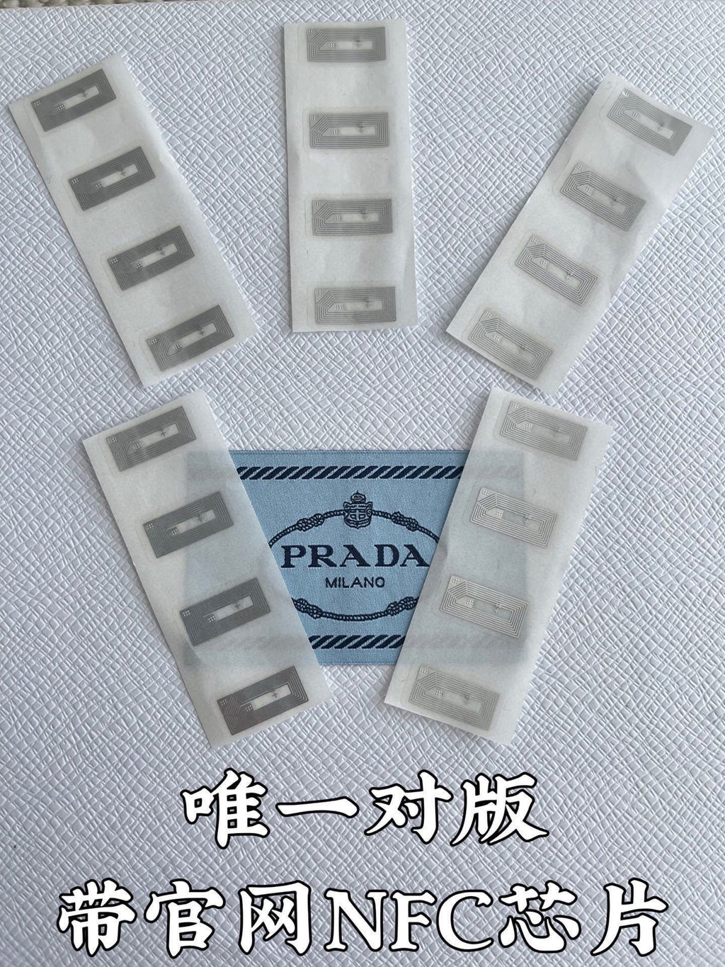 Prada Milan NFC chip label cards set with logo on white sleeves