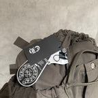 Olive cargo pants with elastic drawstring waistband and attached hangtag