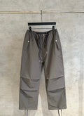 Chrome pants in dark gray with elastic waist, drawstring, side cargo pockets