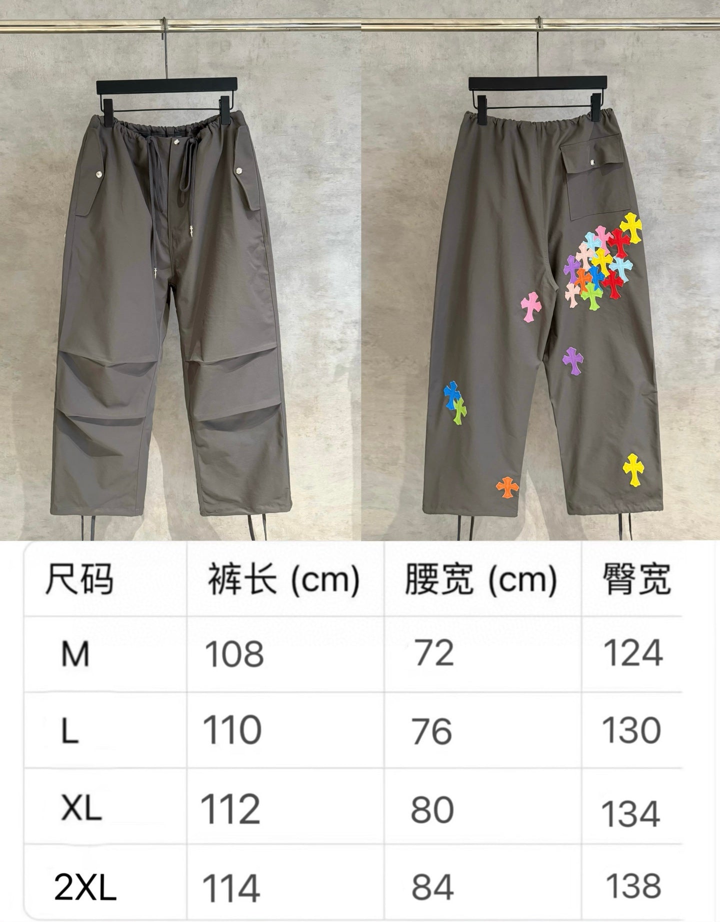 Chrome pants in dark gray, front/back with colorful cross patches; size table