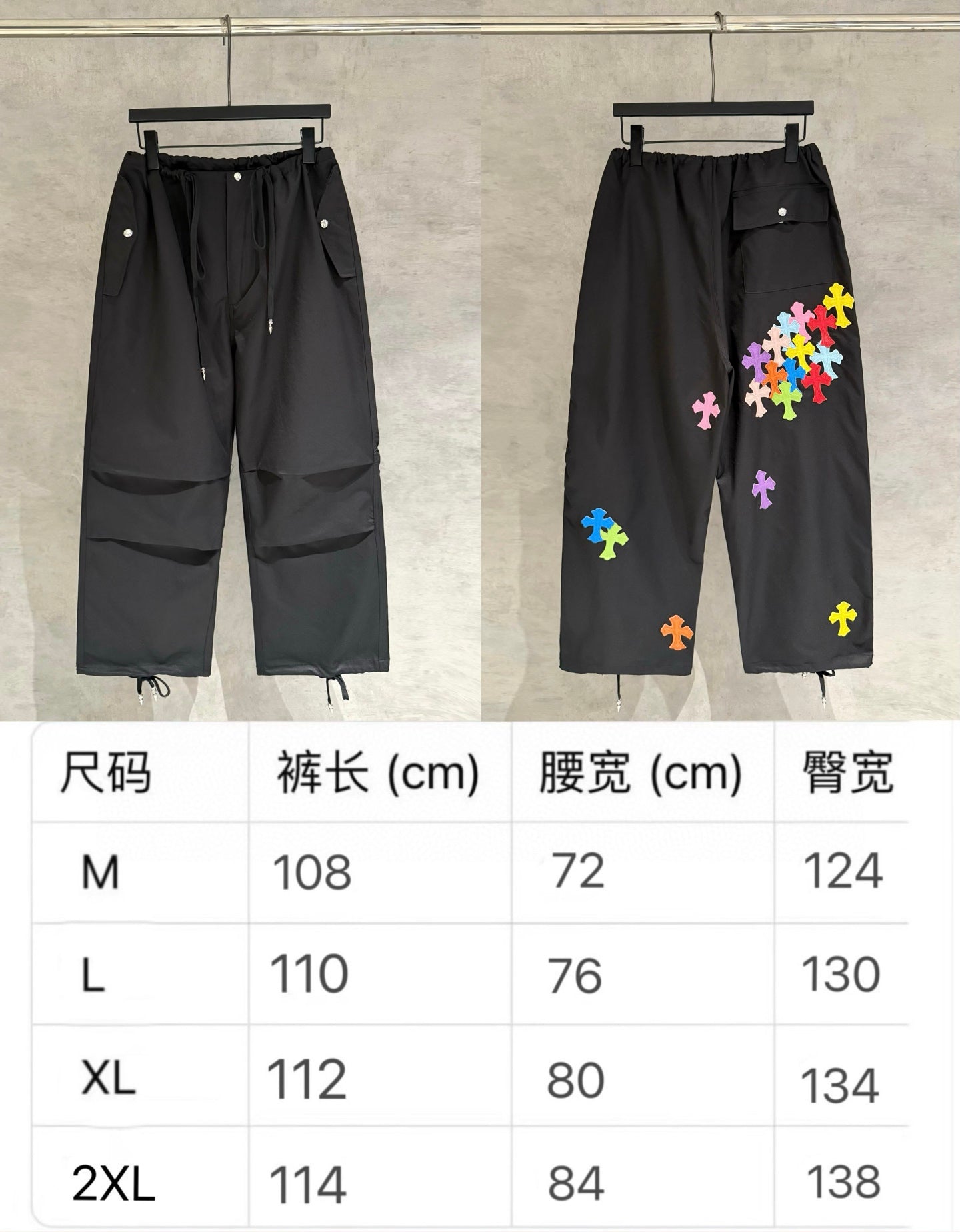 Black pants front and side view with size chart table (M–2XL)