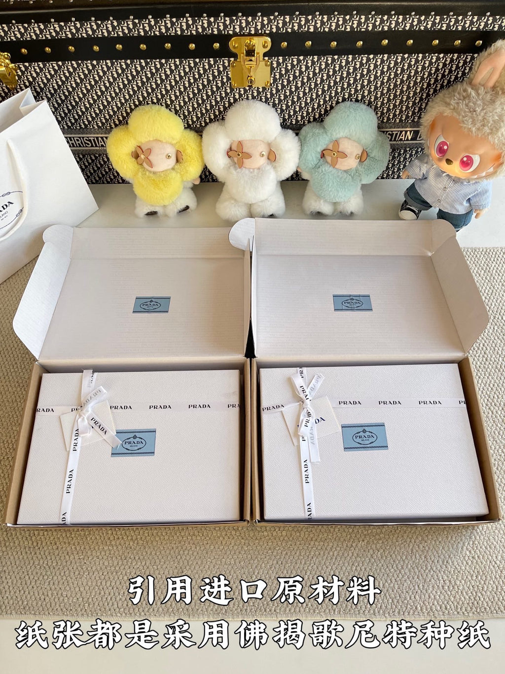 Prada pants packaging boxes with enclosed dust bags and ribbon ties