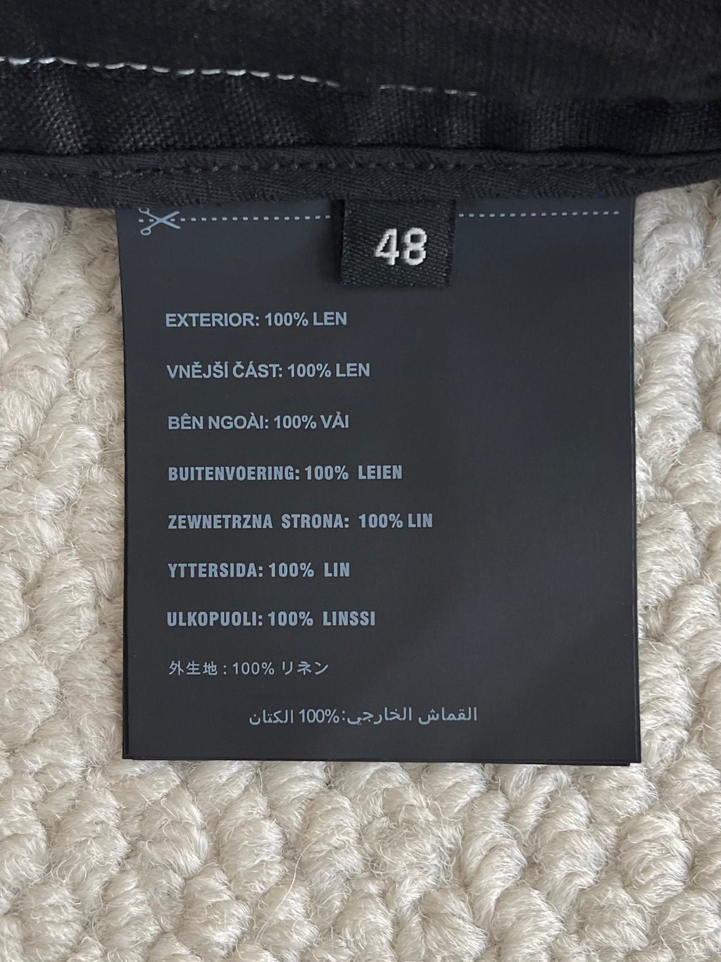 Prada black pants size 48 tag with fabric and care information