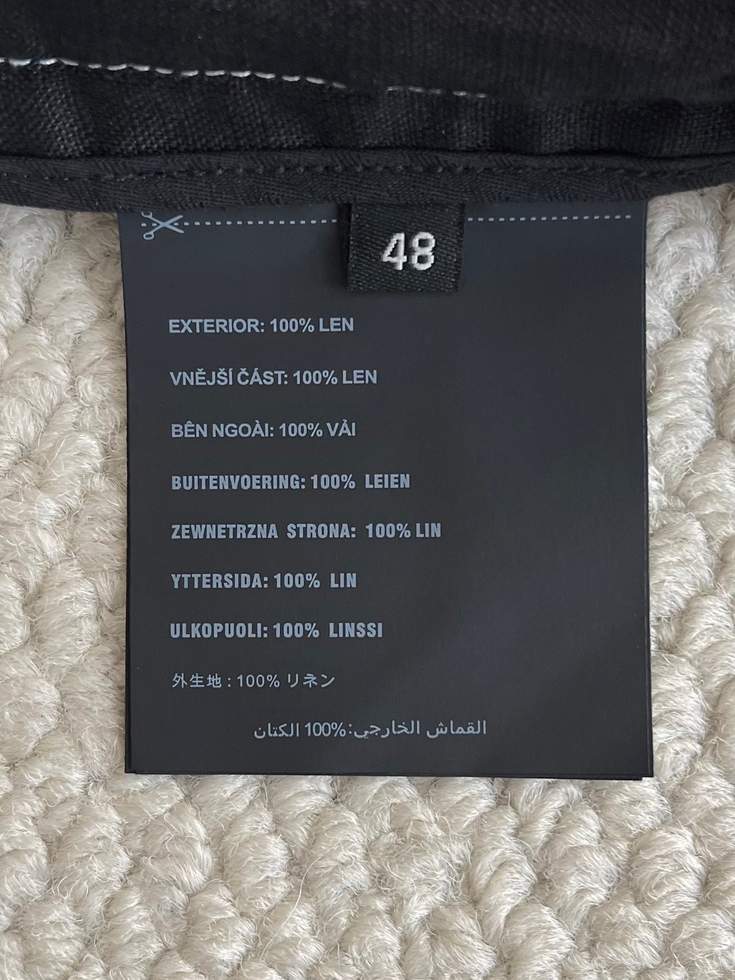 Prada black pants size 48 tag with fabric and care information