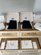 Prada black shorts in boxes, front view with belt loops and stitched pockets