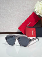 Prada glasses with gray frames and dark gray-tinted lenses