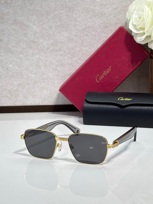 Cartier sunglasses with gold-tone square frames and blue-gray lenses
