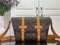 Louis Vuitton monogram bag with tan leather straps and buckles, crossbody style