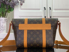 Louis Vuitton monogram bag with tan center strap and shoulder strap, front view