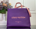 Purple tote bag with tan handles and Louis Vuitton logo on front