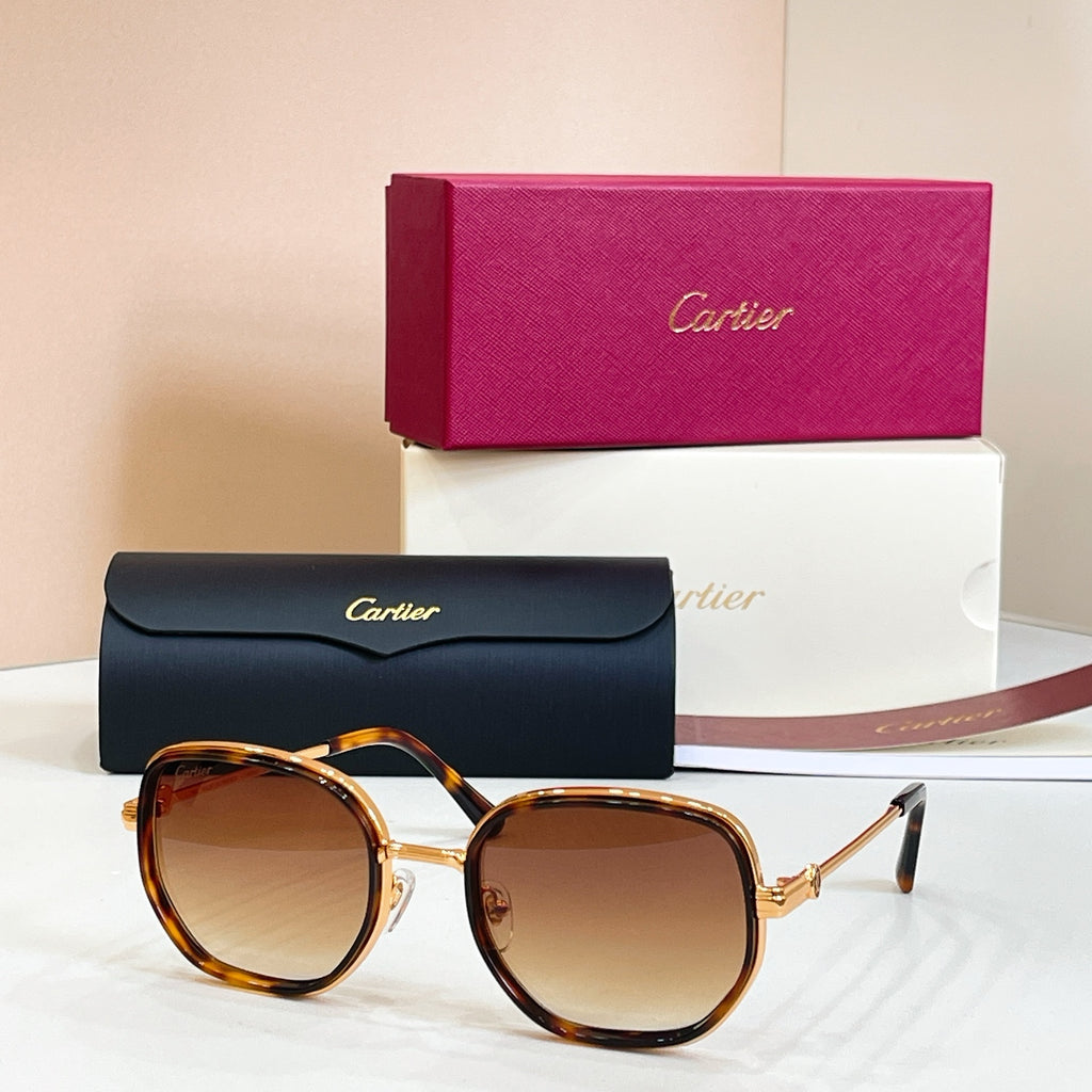 Cartier round sunglasses, tortoise frames with gold-tone hinges and tinted lenses