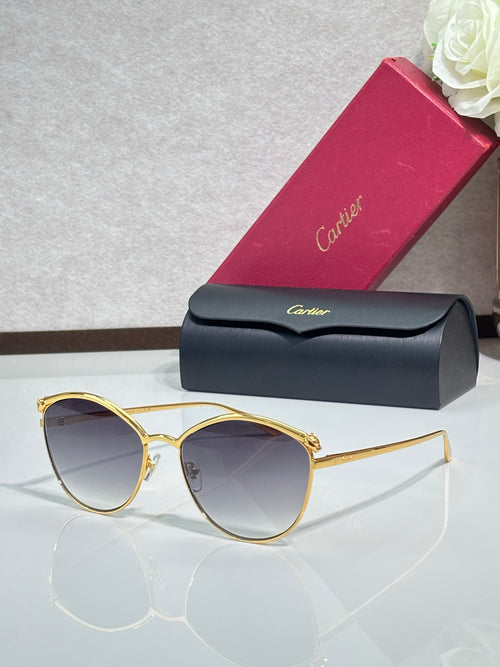 Gold round sunglasses with tinted gray lenses, thin metal frame and clear bridge detail.
