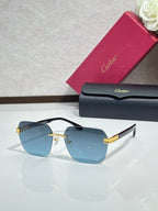Cartier sunglasses with sky-blue lenses and gold-tone metal frame, black temple arms