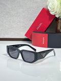 Prada sunglasses with dark gray rectangular frames and gray lenses