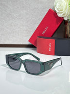 Prada sunglasses with dark green frames and dark lenses