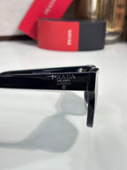 Prada sunglasses temple close-up with Prada Milano engraving