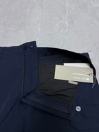 Navy Dior shorts interior with side zip and attached product tags